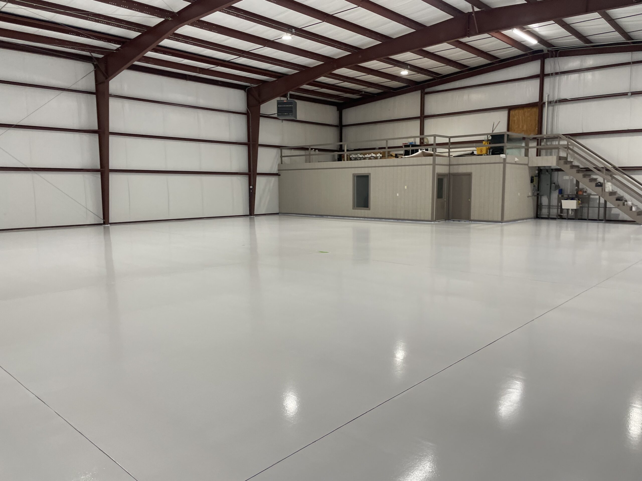 IMG_2865 (1) A spacious room with an epoxy coating floor, and a loft. DPM Surface Care